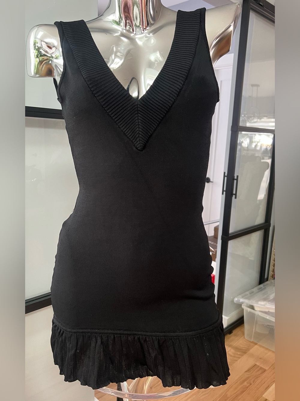 bebe Black V-Neck Ribbed Mini Dress with Pleated Hem